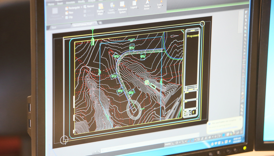 Computer screen showing topographical lines and other structural lines