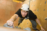 Climber on indoor wall