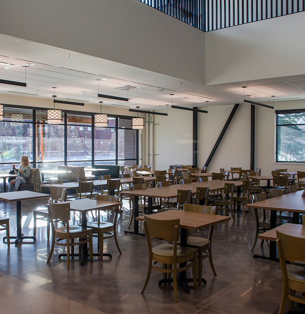 Tables and chairs with windows on sides